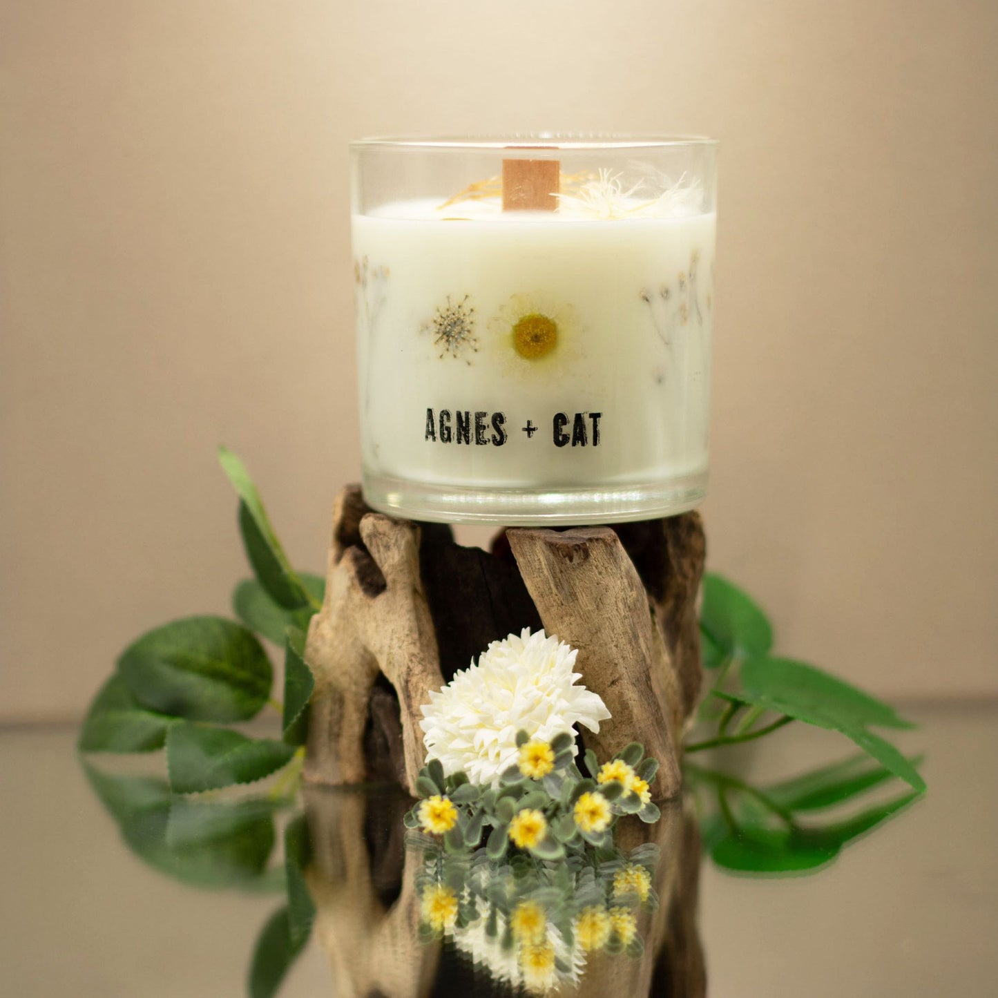 Detailed close up view highlighting the high quality craftsmanship and individual features of the agnes cat botanical soy wax candle windermere525