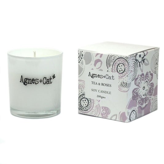 Luxury presentation of the agnes cat votive candle tea and roses540 showing the premium artisan packaging and complete set contents