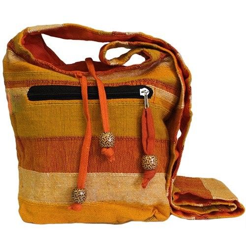 Nepal Sling Bag - Sunrise Orange lifestyle product photo on neutral background