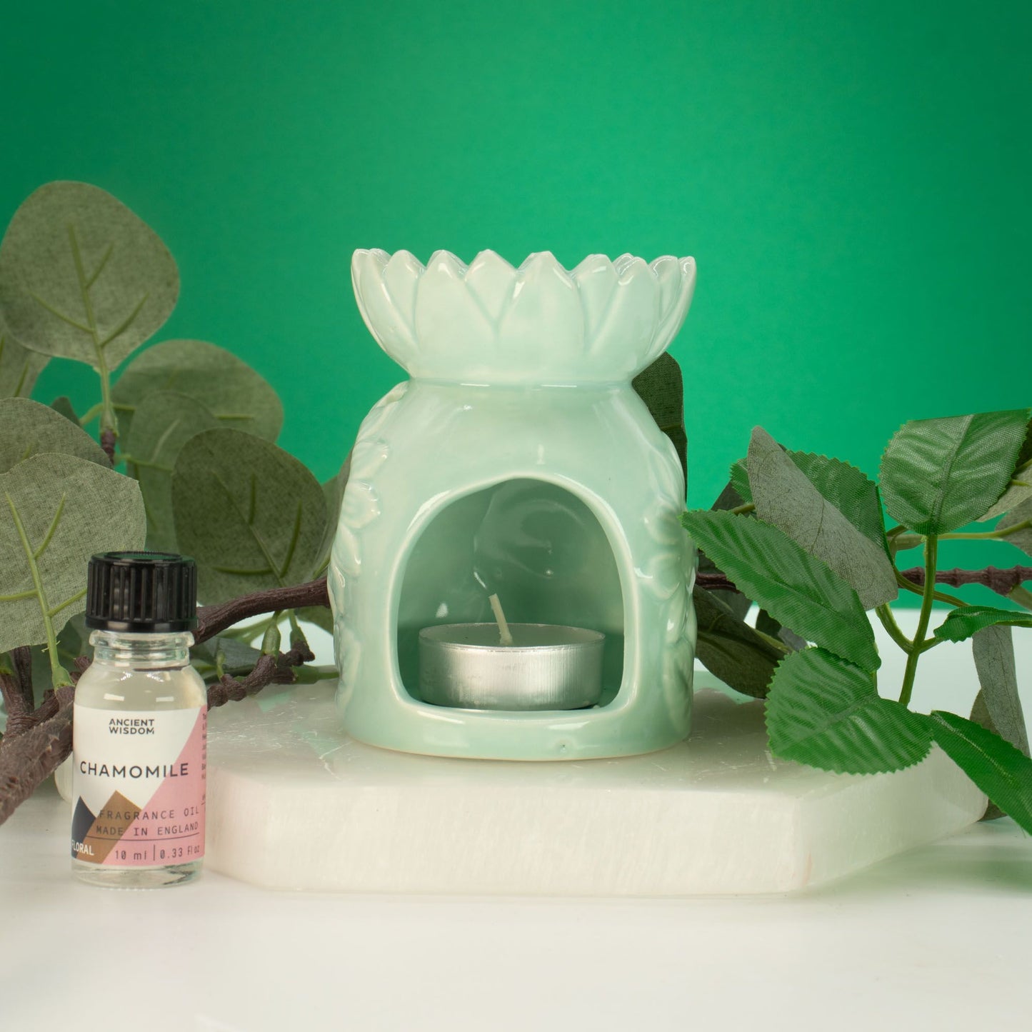 Ceramic Sunflower Oil Burner - Pastel Green from our luxury ceramic zen oil burners collection