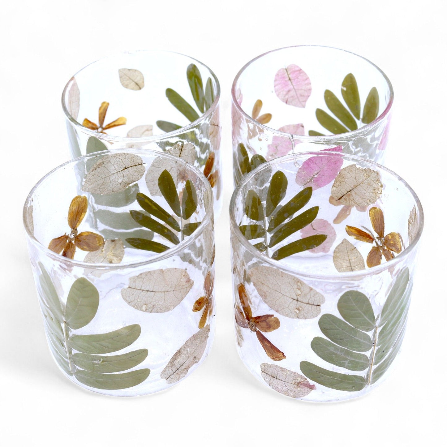 Detailed close up view highlighting the high quality craftsmanship and individual features of the natural floral glass straight candle holder primavera 8x8cm654