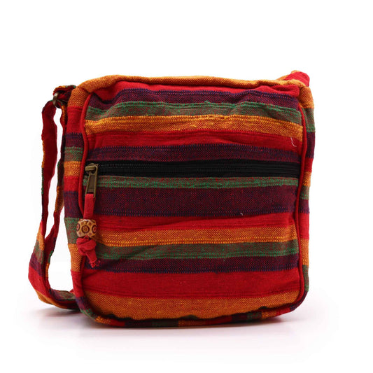 Lrg Nepal Sling Bag  (Adjustable Strap)  - Sunset Reds lifestyle product photo on neutral background