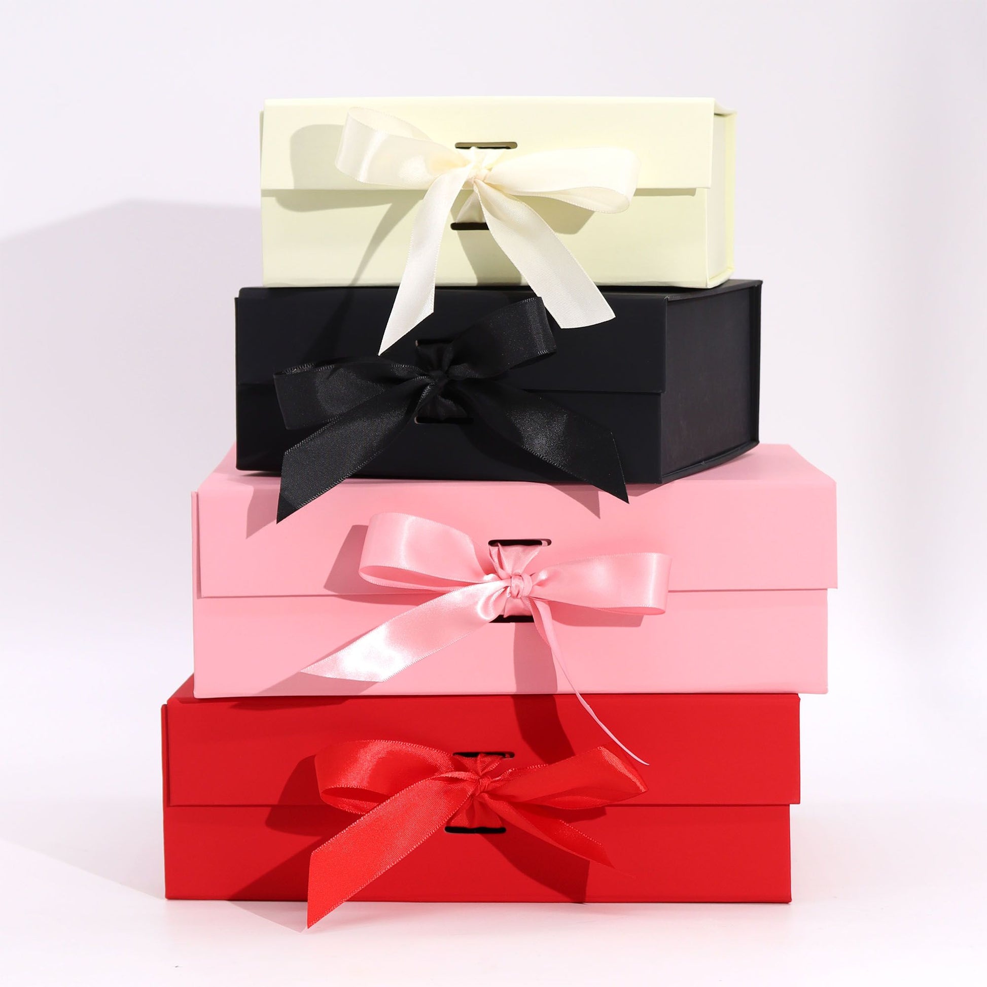 Flat Pack Gift Box - Large  (28.2x20.2x9.2cm) - Pink lifestyle product photo on neutral background