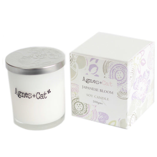 Detailed close up view highlighting the high quality craftsmanship and individual features of the agnes cat votive candle japanese bloom608