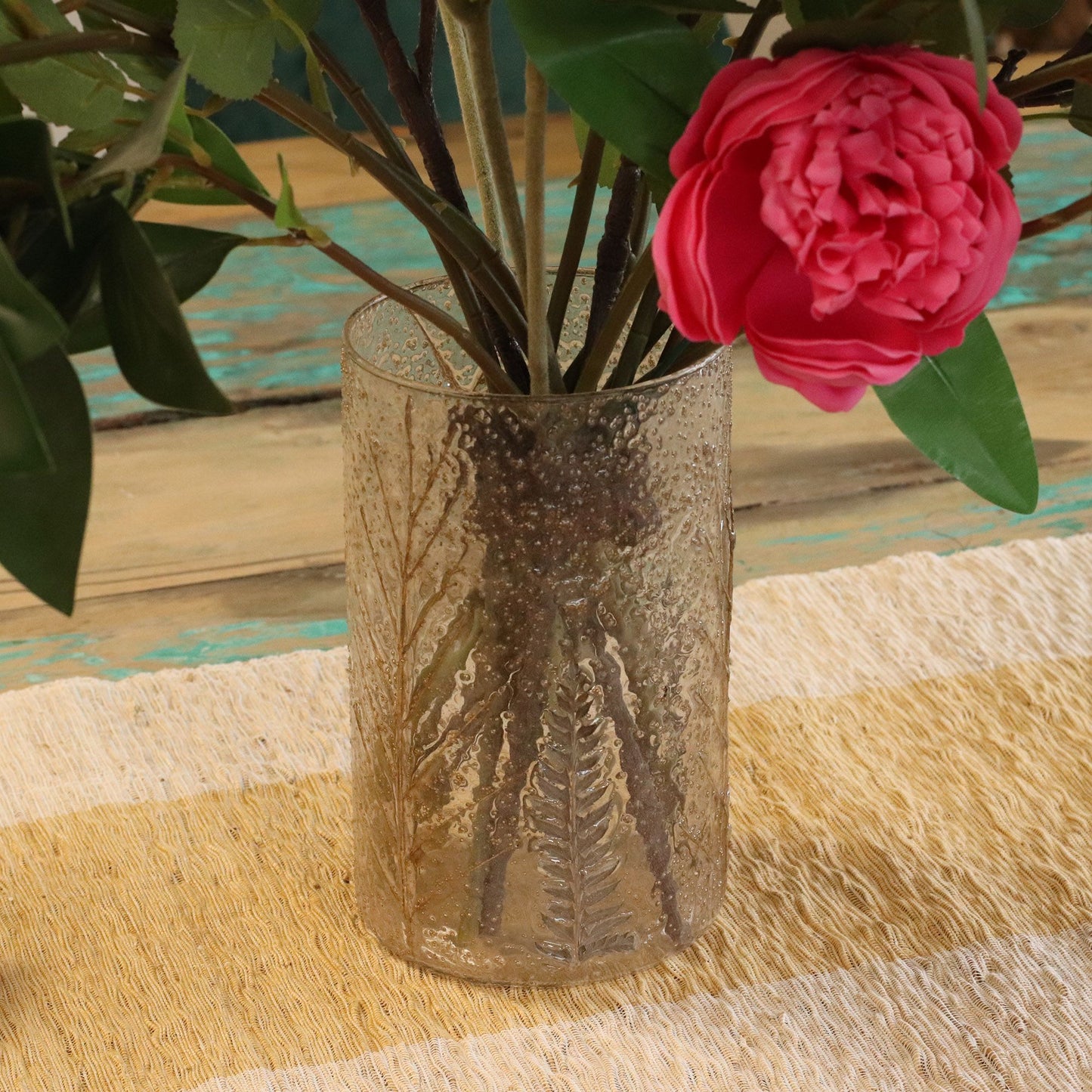 Detailed close up view highlighting the high quality craftsmanship and individual features of the natural floral glass tall vase candle holder pino 19x11cm419