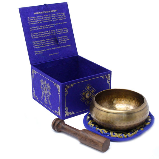 Medicine Buddha Singing Bowl Set 10cm (min 500gm) lifestyle product photo on neutral background