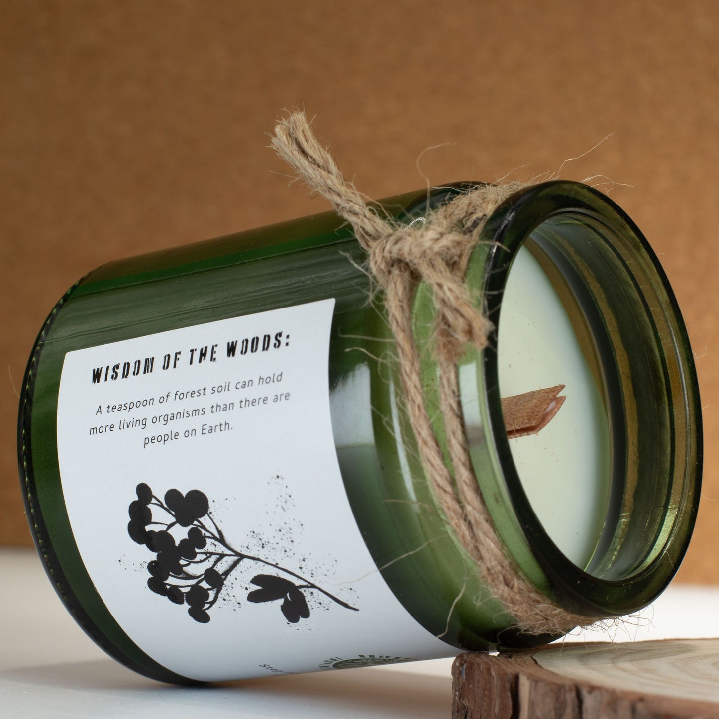 Detailed close up view highlighting the high quality craftsmanship and individual features of the greenman woodwick soy candle woodland zest404