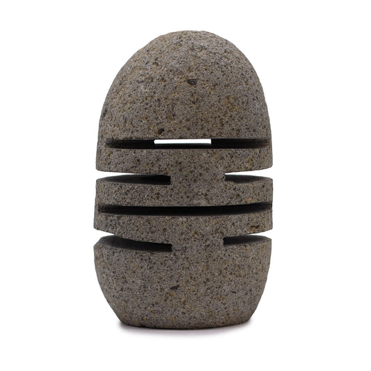 Luxury presentation of the natural riverstone candle holder standing stone cut596 showing the premium artisan packaging and complete set contents