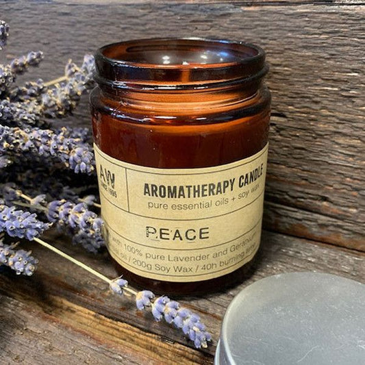 Luxury presentation of the aromatherapy candle peace391 showing the premium artisan packaging and complete set contents