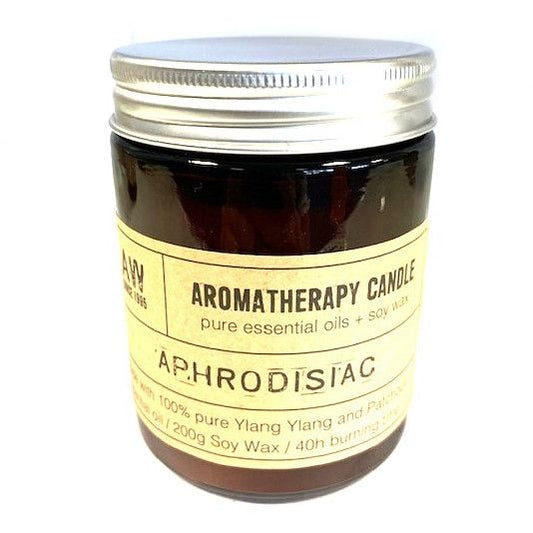 Luxury presentation of the aromatherapy candle aphrodisiac456 showing the premium artisan packaging and complete set contents
