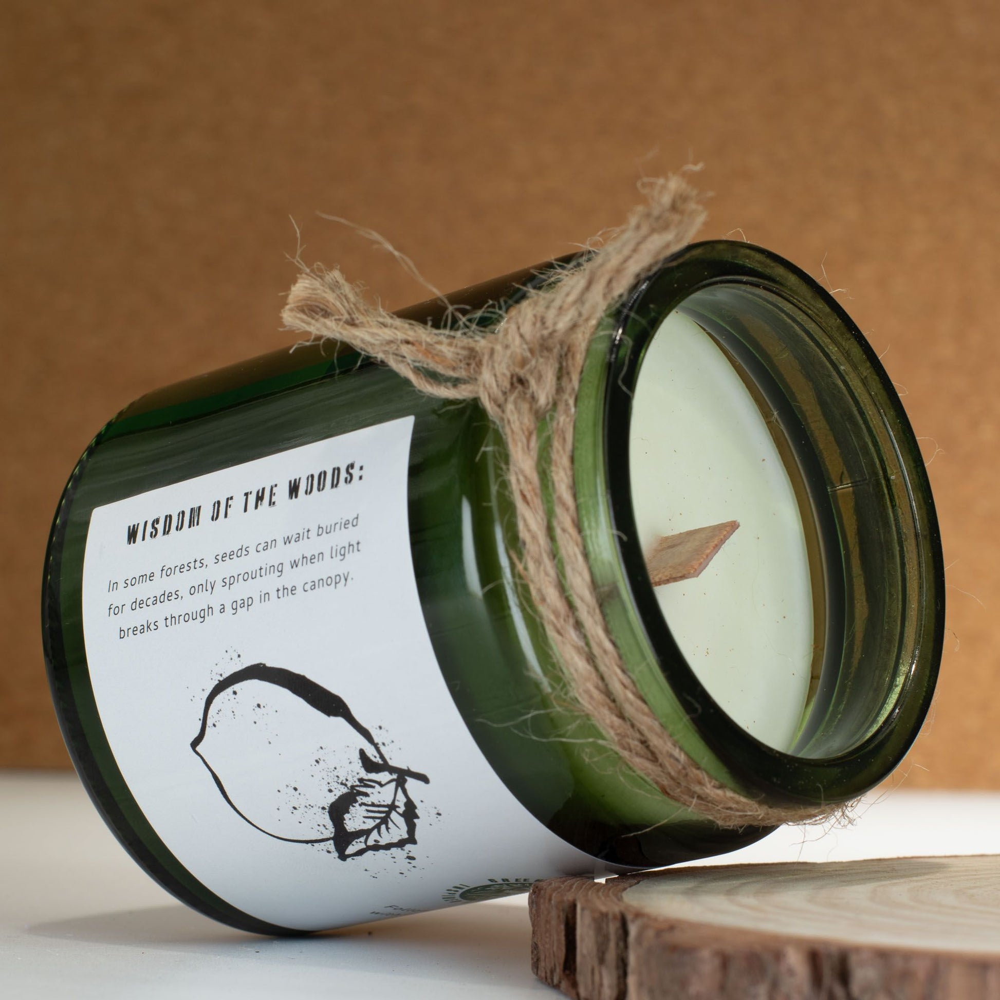 Detailed close up view highlighting the high quality craftsmanship and individual features of the greenman woodwick soy candle cedar citrus447
