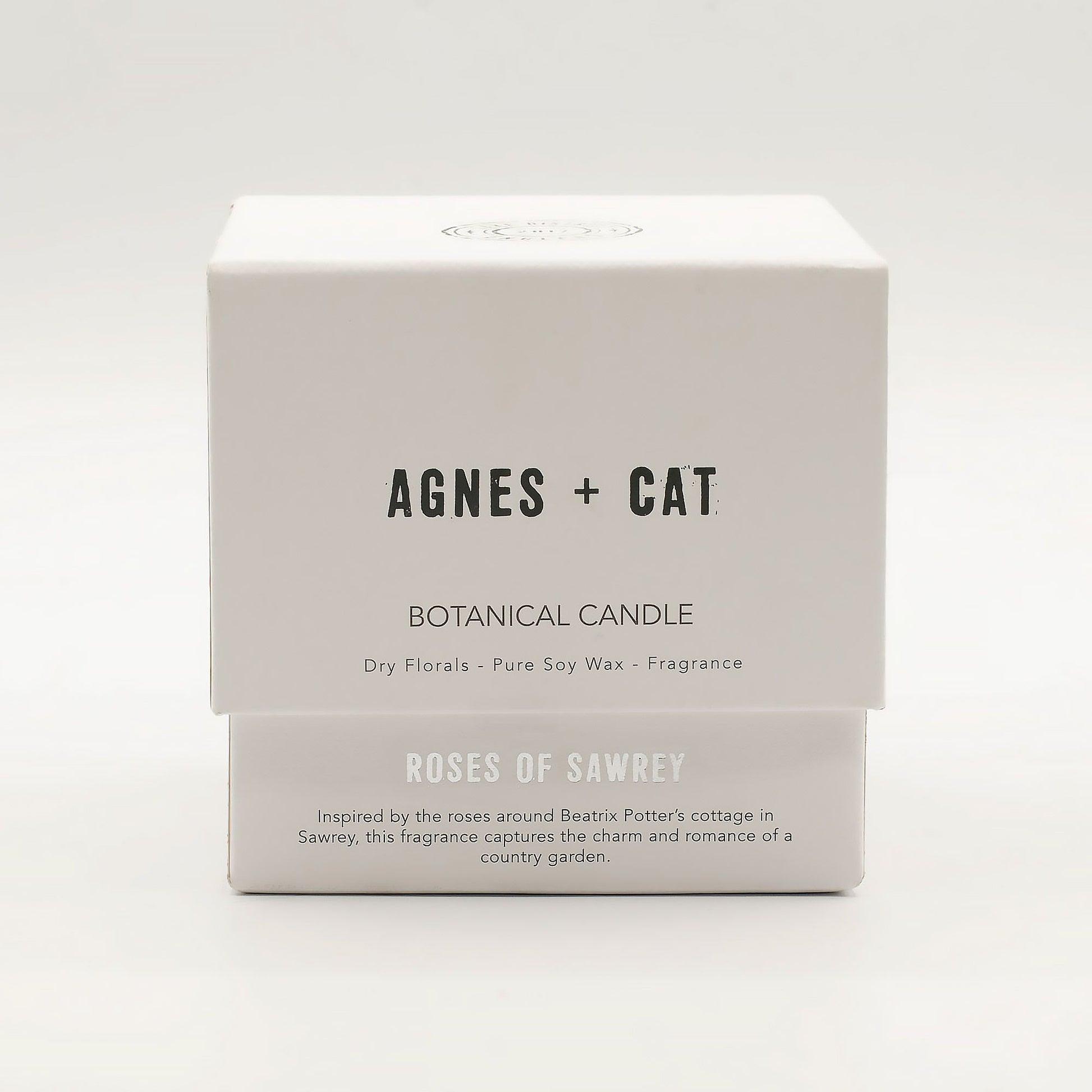 Detailed close up view highlighting the high quality craftsmanship and individual features of the agnes cat botanical soy wax candle roses of sawrey463