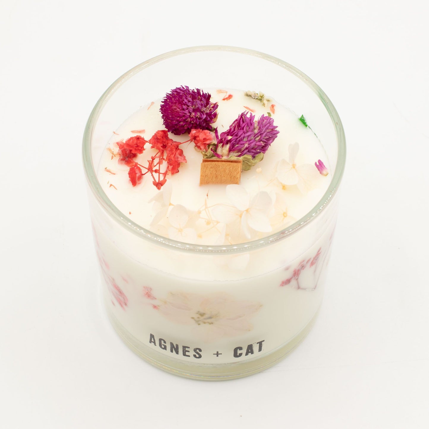 Detailed close up view highlighting the high quality craftsmanship and individual features of the agnes cat botanical soy wax candle roses of sawrey463