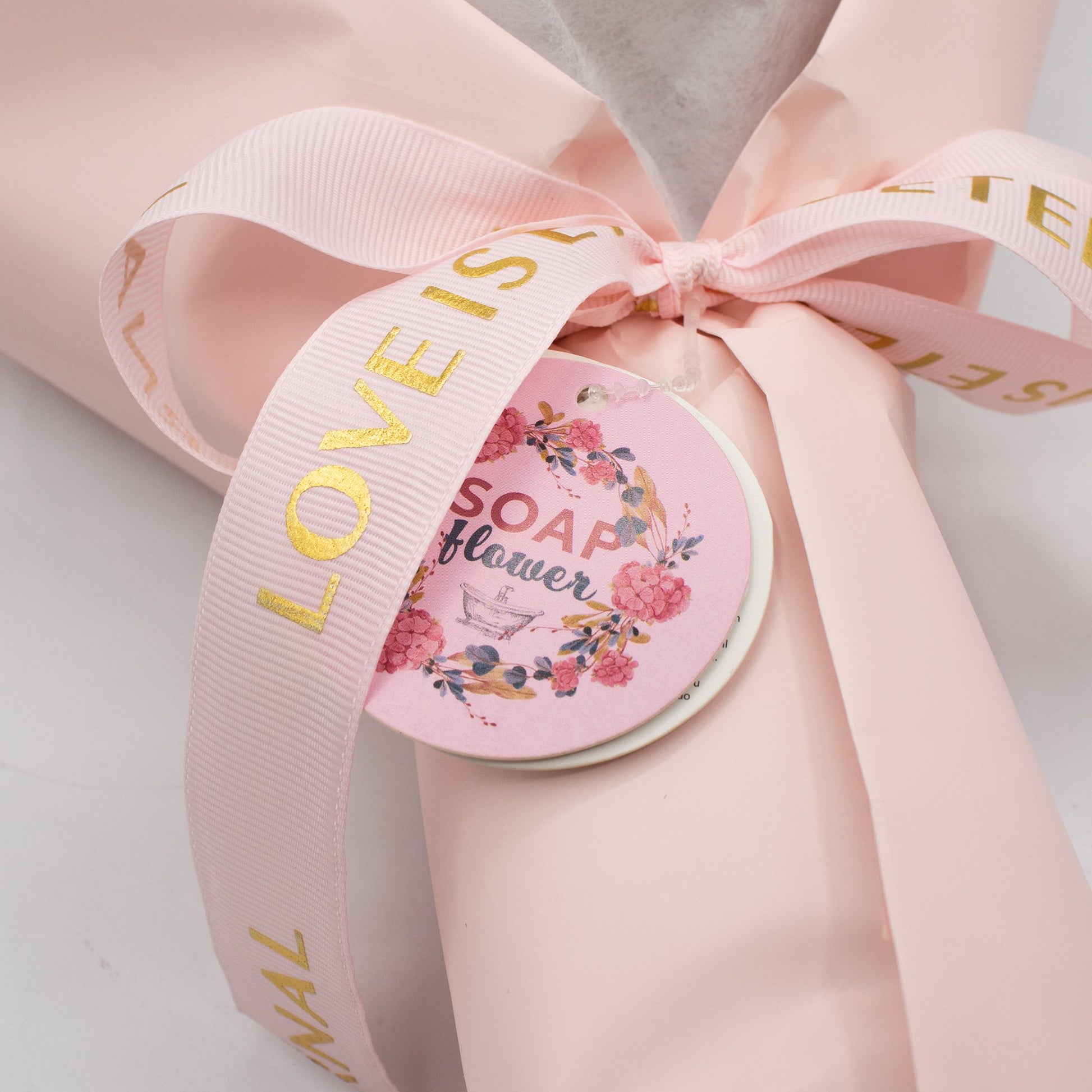 Detailed close up view highlighting the high quality craftsmanship and individual features of the large pink roses bouquet love is eternal gift card818