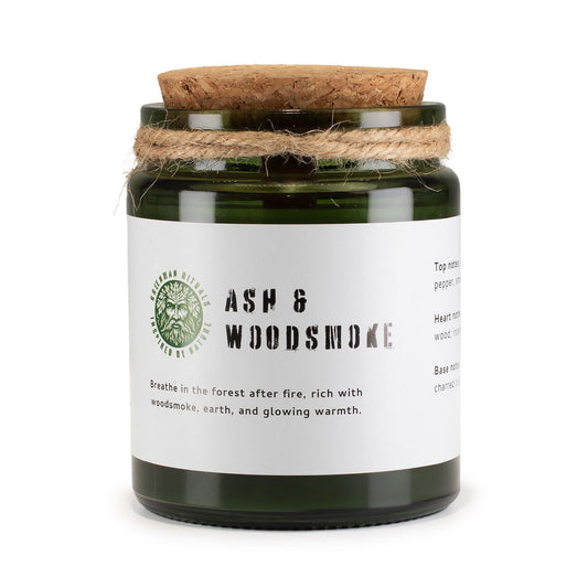 Luxury presentation of the greenman woodwick soy candle ash woodsmoke481 showing the premium artisan packaging and complete set contents