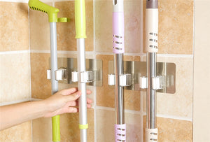 Organise your cleaning supplies with our wall mounted mop organiser holder