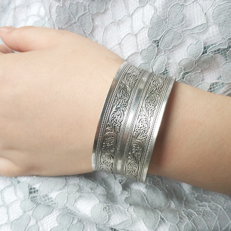 Carved wide-angle Tibetan silver bracelet